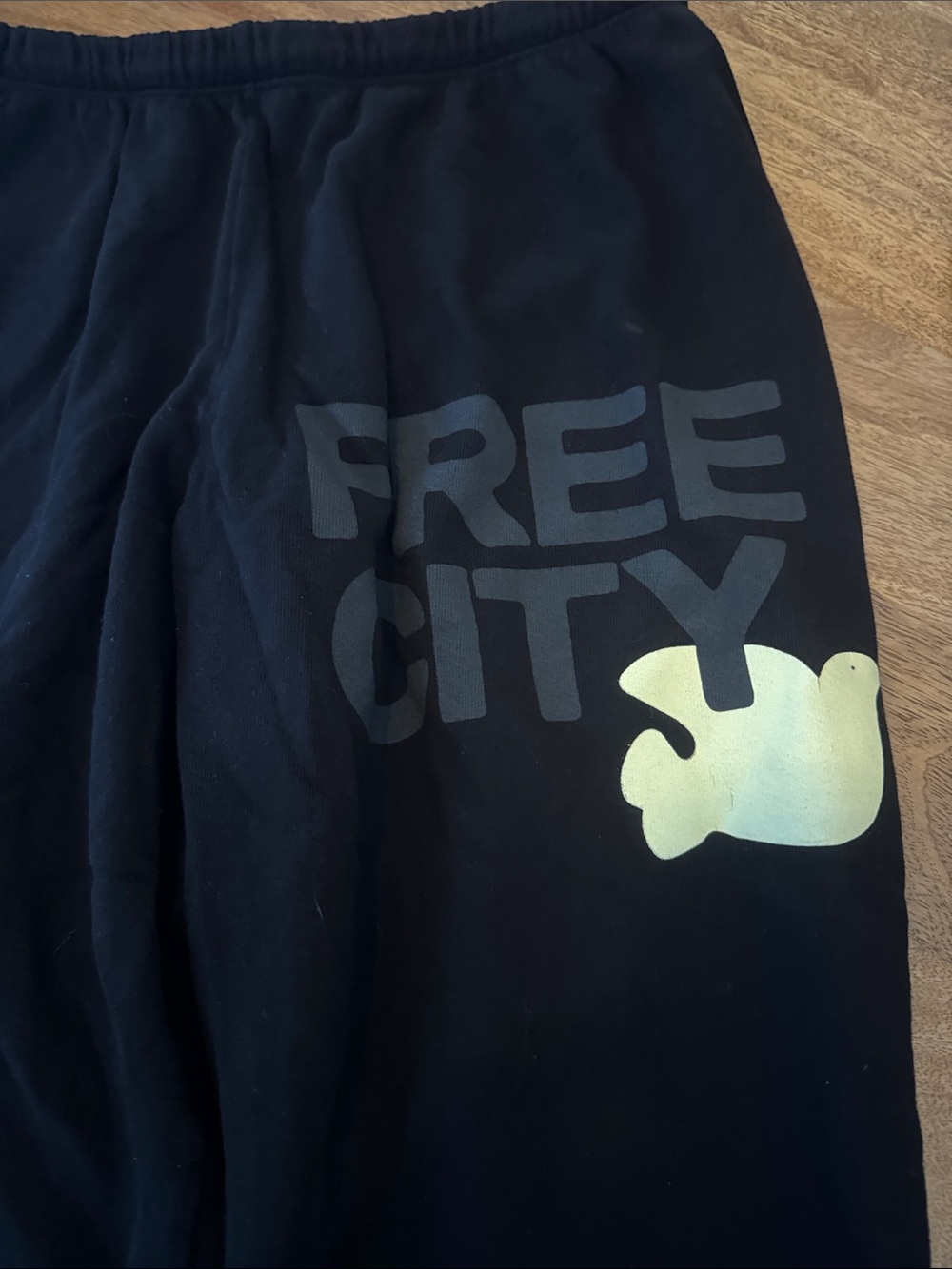 freecity adult Black Sweatpants with Pale Yellow Dove Graphic